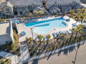 an aerial view of a pool at a resort at Good To Be Home where your family can relax in Washington