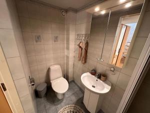 Koupelna v ubytování Cosy flat near Kuressaare castle