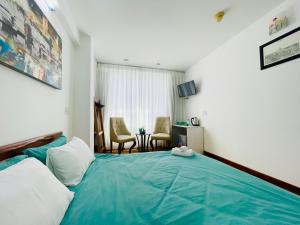 Rúm í herbergi á Onestar Danang Riverside
