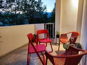 a group of chairs and a table on a patio at Luxury apartment Olivia in Mostar +38 photos