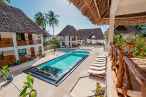 een afbeelding van een villa met zwembad bij Mayai Ocean Resort in Bwejuu