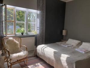 Postel nebo postele na pokoji v ubytování Scandinavian Style Wooden House Flat