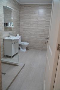 Ванная комната в Vila Exclusive