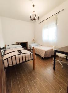 Postel nebo postele na pokoji v ubytování Casa del Tucán