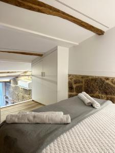 Postel nebo postele na pokoji v ubytování Celanova House
