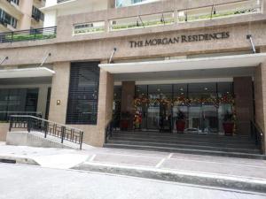 un edificio con los renos morwegianos firmados en él en Scandi Minimalist Mckinley Hill BGC en Manila