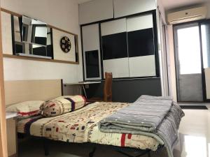 En eller flere senger på et rom på Mitra@MitraguesthouseB28-6