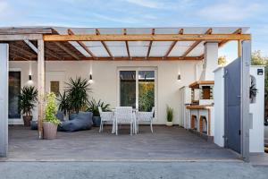 Patio nebo venkovní prostory v ubytování Jacuzzi deluxe villa