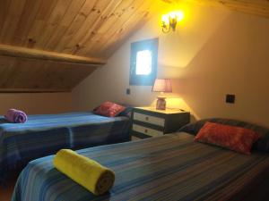 Posteľ alebo postele v izbe v ubytovaní La Casa del Abuelo Simón + 35 fotografií