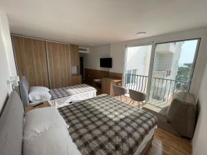 Postel nebo postele na pokoji v ubytování Hotel R + 37 fotografií