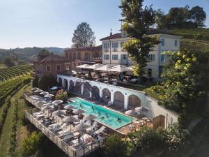 an aerial view of a hotel with a swimming pool at Villa Tiboldi in Canale