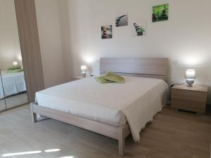 Katil atau katil-katil dalam bilik di Meli Appartamenti