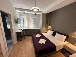 Postel nebo postele na pokoji v ubytování Soin Rooms