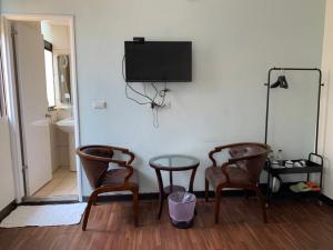 TV a/nebo společenská místnost v ubytování Fu Hwa Homestay