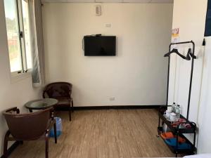 TV a/nebo společenská místnost v ubytování Fu Hwa Homestay