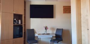 TV a/nebo společenská místnost v ubytování Suite Kleine Auszeit