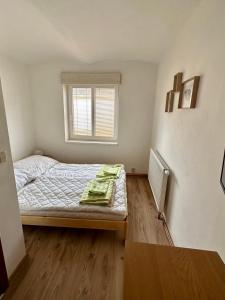 Postel nebo postele na pokoji v ubytování U nás na chalupě
