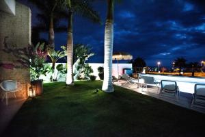 Bazén v ubytovaní Villa Caleta Golf alebo v jeho blízkosti