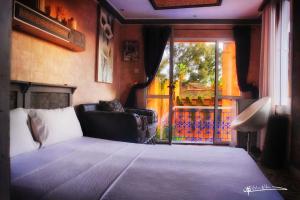 Letto o letti in una camera di Riad Hicham