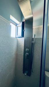 Kúpeľňa v ubytovaní Theros Room + 13 fotografií