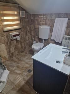 Koupelna v ubytování Casa Andu