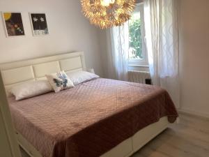 Posteľ alebo postele v izbe v ubytovaní Apartman Brankica