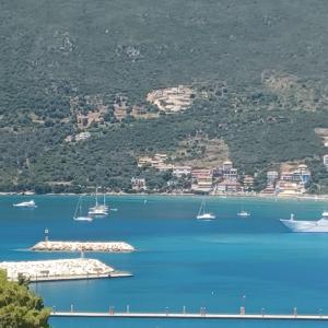 a group of boats in a large body of water at Penthouse Vasiliki in Vasiliki