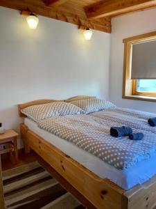 En eller flere senge i et værelse på Drozdí hnízdo