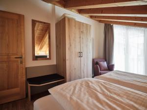 Voodi või voodid majutusasutuse Hotel Hubertus toas