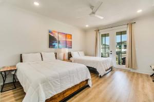 Ένα ή περισσότερα κρεβάτια σε δωμάτιο στο Modern Luxury 4BR Pool Bay Access Outdoor Dining +37 φωτογραφίες