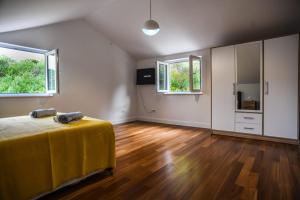 TV a/nebo společenská místnost v ubytování Boutique Hotel Tomić