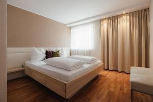 Postel nebo postele na pokoji v ubytování La Residence