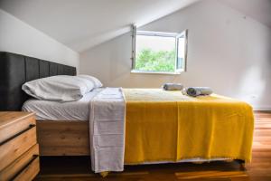 Postel nebo postele na pokoji v ubytování Boutique Hotel Tomić