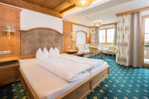 Posteľ alebo postele v izbe v ubytovaní Hotel Silberberger - Wildschönau