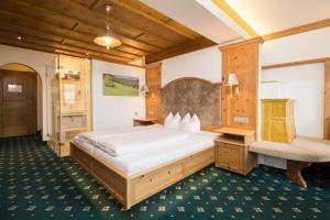 Posteľ alebo postele v izbe v ubytovaní Hotel Silberberger - Wildschönau