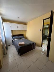 a bedroom with a bed in a room at House to rent in a Gated Community with 24hr Security 