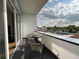 Balkón nebo terasa v ubytování SUITE4ME - Balkon I Küche I Waschmaschine I Mainz-Kostheim