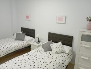 Posteľ alebo postele v izbe v ubytovaní casa EDEN