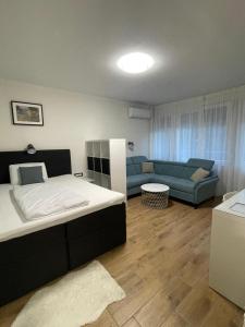 A bed or beds in a room at Apartment Karlovac Center