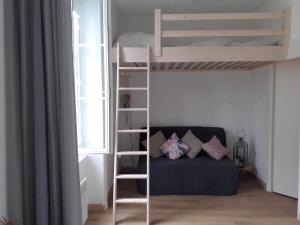 Postel nebo postele na pokoji v ubytování Studio 400m de la mer