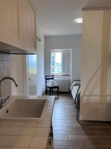 Ένα ή περισσότερα κρεβάτια σε δωμάτιο στο O Nini! di Monteverdi Marittimo, Borgo di Canneto