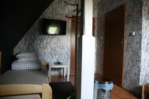 Giường trong phòng chung tại Noclegi u Matyldy
