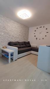 Część wypoczynkowa w obiekcie Apartmani Novak - Vir