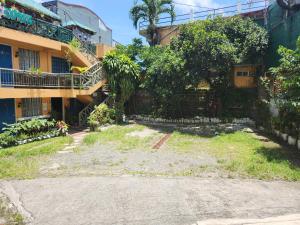 an alley in front of a building at Country Sampler Inn in Tagaytay