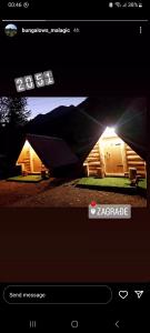 a picture of a tent with the light shining on it at Bungalows Malagić in Gusinje