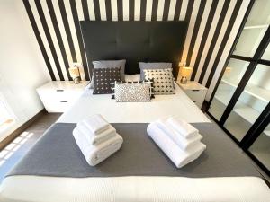 Cama o camas de una habitación en KS Toyo Golf - Kaleria Suites