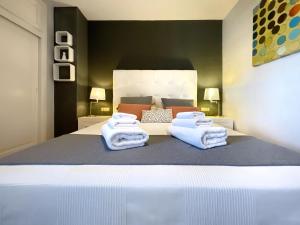 Ένα ή περισσότερα κρεβάτια σε δωμάτιο στο KS Golf Playa