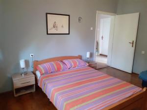 Postel nebo postele na pokoji v ubytování Lep apartman TARA -Kremna