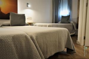 Krevet ili kreveti u jedinici u okviru objekta Margaritas 21 Rooms