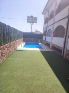 Swimmingpoolen hos eller tæt på Apartamento Los Vencejos